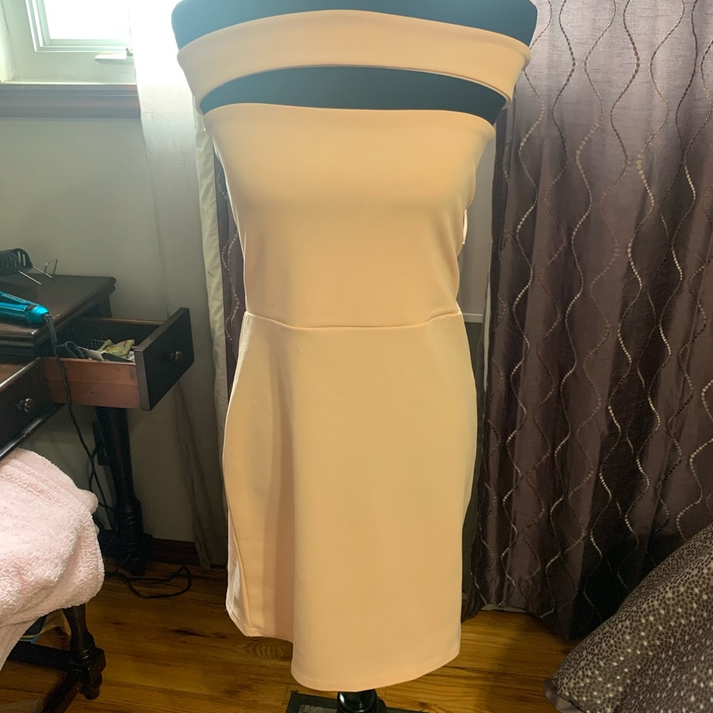 Peek a boo dress.. This Style in right now!!